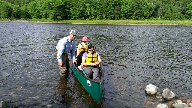 Canoe crossing Kennebec River